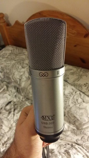 To use my microphone, you have to speak into the side. It connects to a PC with a USB cable, and works with no additional software.